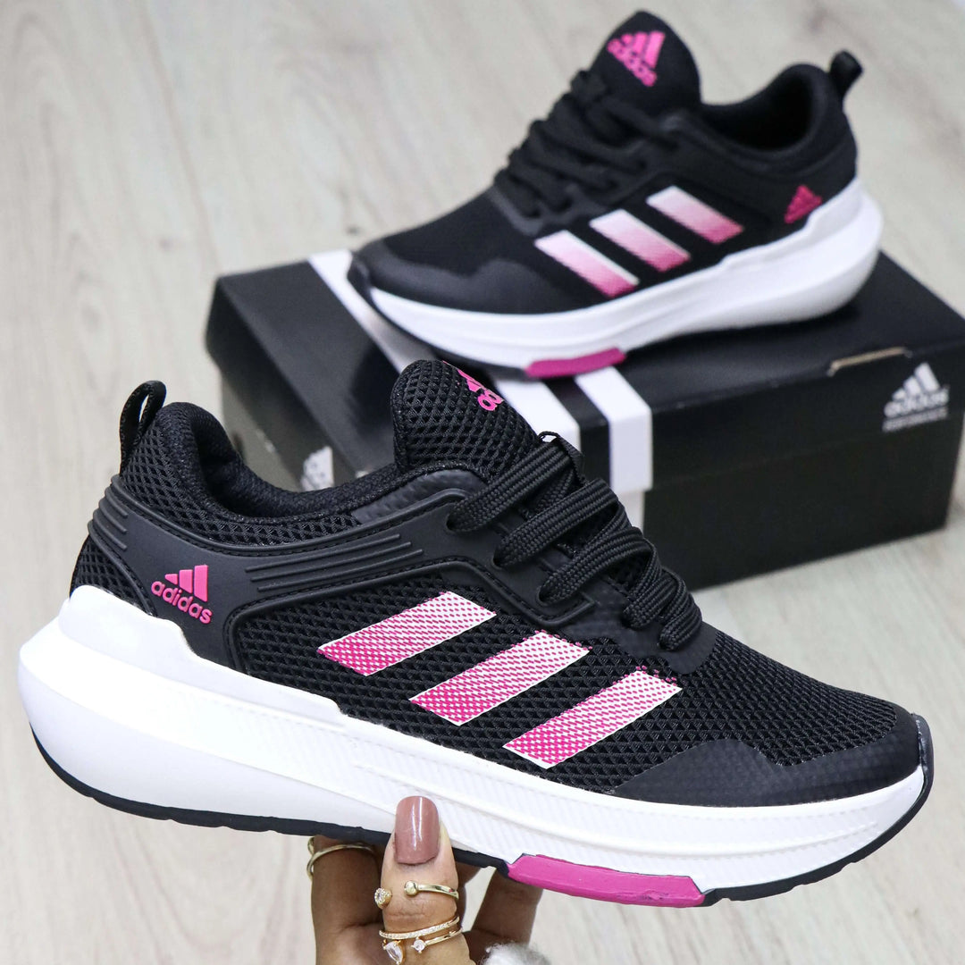 Zapatillas Falcon negras con detalles rosados, diseño ligero y transpirable, suela antideslizante para máxima seguridad y comodidad durante todo el día, ideales para deporte y uso casual.