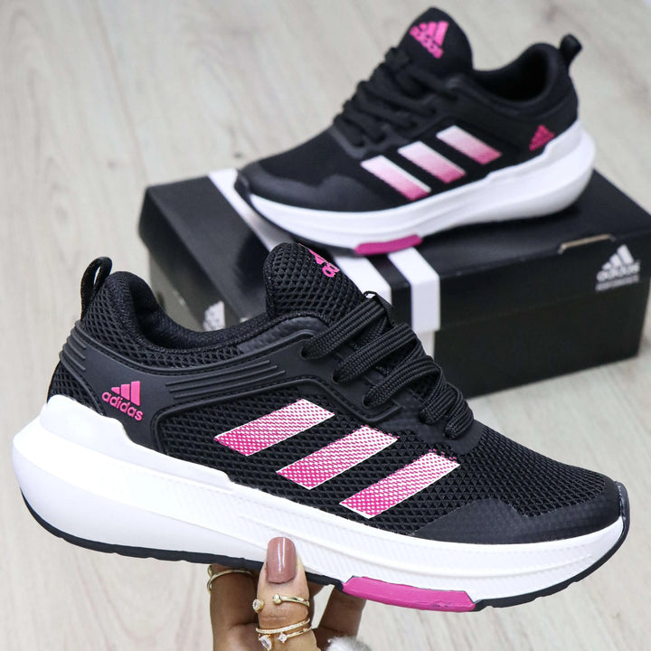 Zapatillas Falcon negras con detalles rosados, diseño ligero y transpirable, suela antideslizante para máxima seguridad y comodidad durante todo el día, ideales para deporte y uso casual.