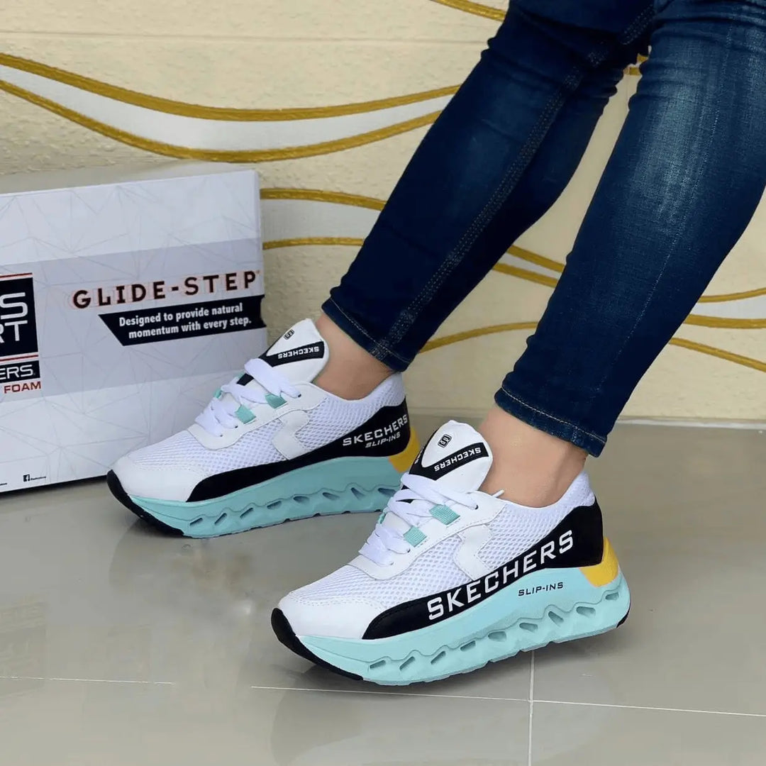 Zapatillas Madrid en malla blanca con suela de espuma turquesa, ligeras, transpirables y con amortiguación antideslizante para confort diario
