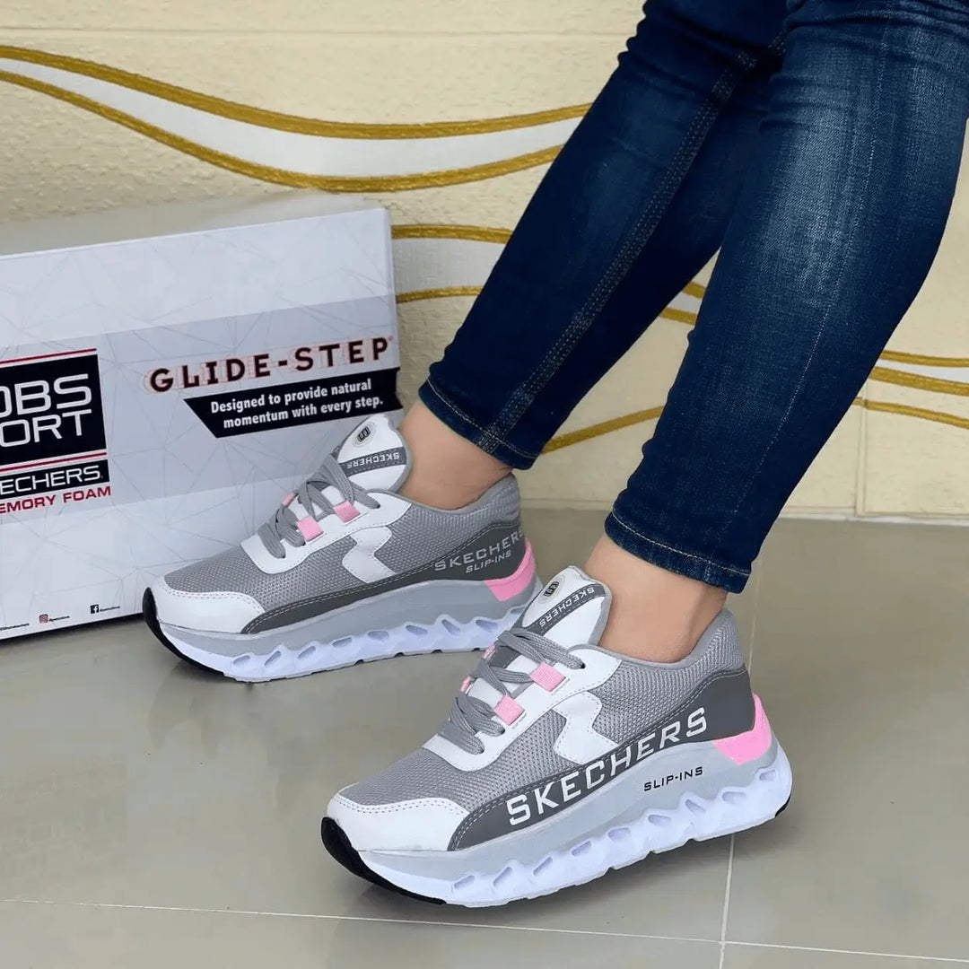 Zapatillas Madrid calzado deportivo de mujer color gris con acentos rosa, suela ligera de espuma con amortiguación óptima, forro transpirable y diseño urbano moderno para máxima comodidad al caminar