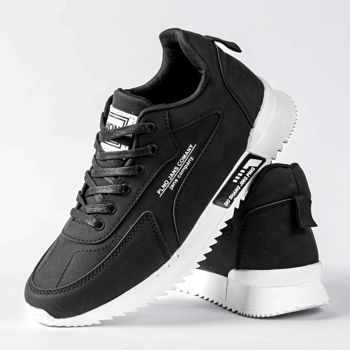 Zapatillas negras para hombre con diseño moderno y cómodo, suela blanca antideslizante, ideales para uso casual y deportivo, fabricadas con materiales transpirables y duraderos que ofrecen soporte y confort durante todo el día.