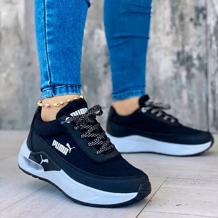 Zapatillas Sport Run negras clásicas para damas y caballeros con cámara de aire visible y diseño urbano ligero