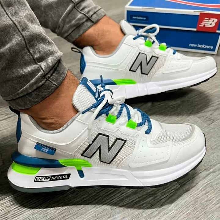 Zapatillas deportivas blancas con detalles en azul y verde neón, diseño moderno y transpirable ideal para caminar y correr con máxima comodidad y soporte, suela antiderrapante y tecnología avanzada para amortiguación y durabilidad, perfectas para uso diario y actividades deportivas.