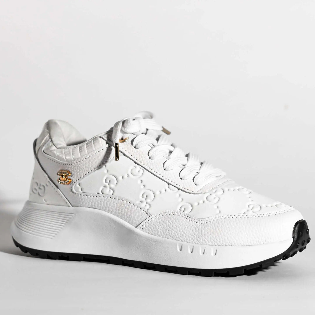 Zapatillas blancas para mujer, diseño moderno y elegante, hechas con materiales resistentes y cómodos, suela antideslizante para mayor seguridad y plantilla acolchada que ofrece soporte y confort durante todo el día.