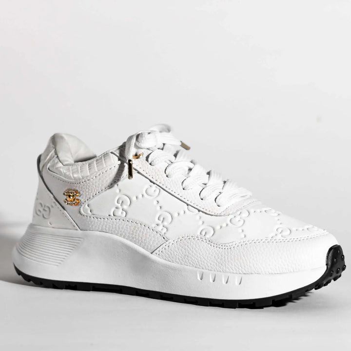 Zapatillas blancas para mujer, diseño moderno y elegante, hechas con materiales resistentes y cómodos, suela antideslizante para mayor seguridad y plantilla acolchada que ofrece soporte y confort durante todo el día.