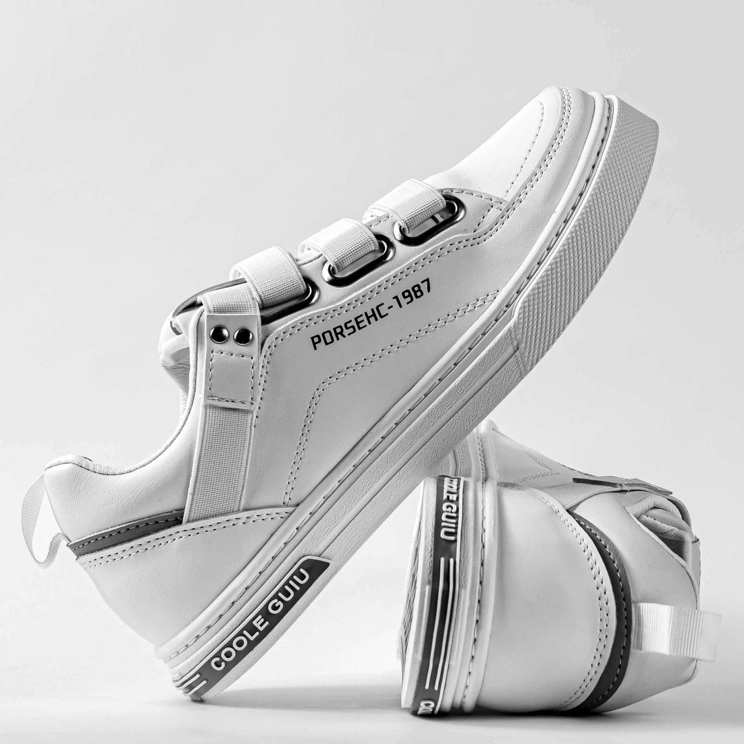 Zapatos deportivos blancos para hombre con diseño moderno, suela antideslizante y cierre ajustable de velcro, ideales para uso diario, cómodos, duraderos y con estilo casual para combinar con diferentes outfits.