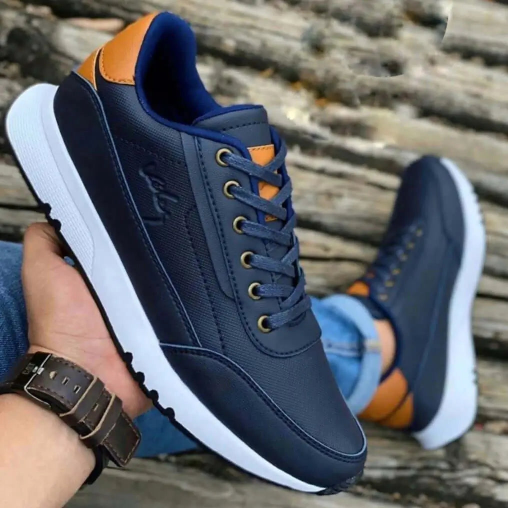 zapatos deportivos cómodos para hombre en colores azul y naranja con suela blanca antideslizante, diseño moderno y duradero, ideales para uso casual y actividades diarias con soporte ergonómico y materiales transpirables que proporcionan confort durante todo el día