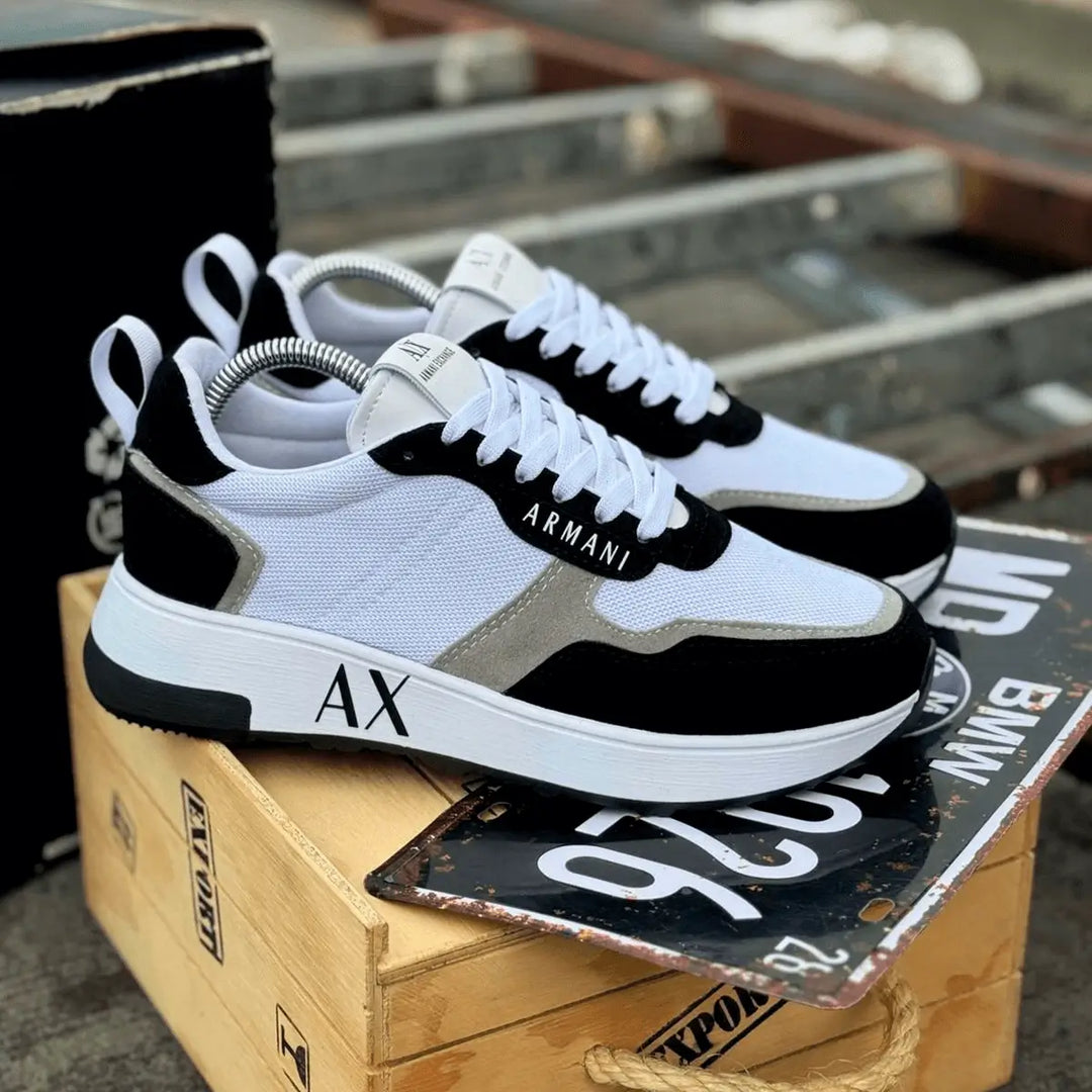 Tenis Urbano negro blanco y gris estilo moderno para hombre, calzado cómodo y ligero con suela antideslizante, ideal para uso diario y actividades urbanas, diseño exclusivo para máxima durabilidad y soporte.