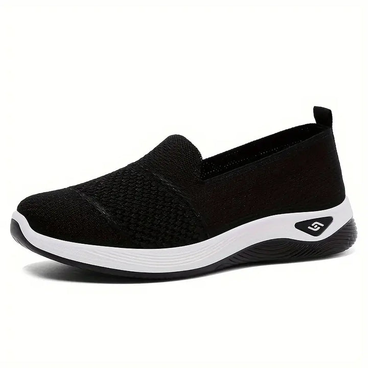 Zapatillas livianas negras para mujer, calzado cómodo y transpirable con suela antideslizante y diseño ergonómico ideal para uso diario y actividades al aire libre.