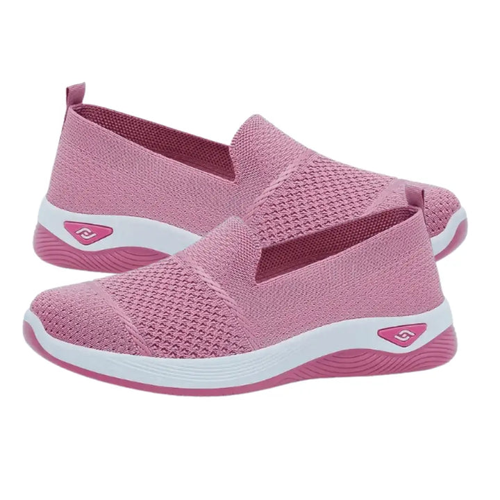 Zapatillas livianas color rosa para mujer, diseño transpirable de malla, suela antideslizante y cómoda para uso diario, ideales para caminar y actividades casuales, calzado versátil y moderno.