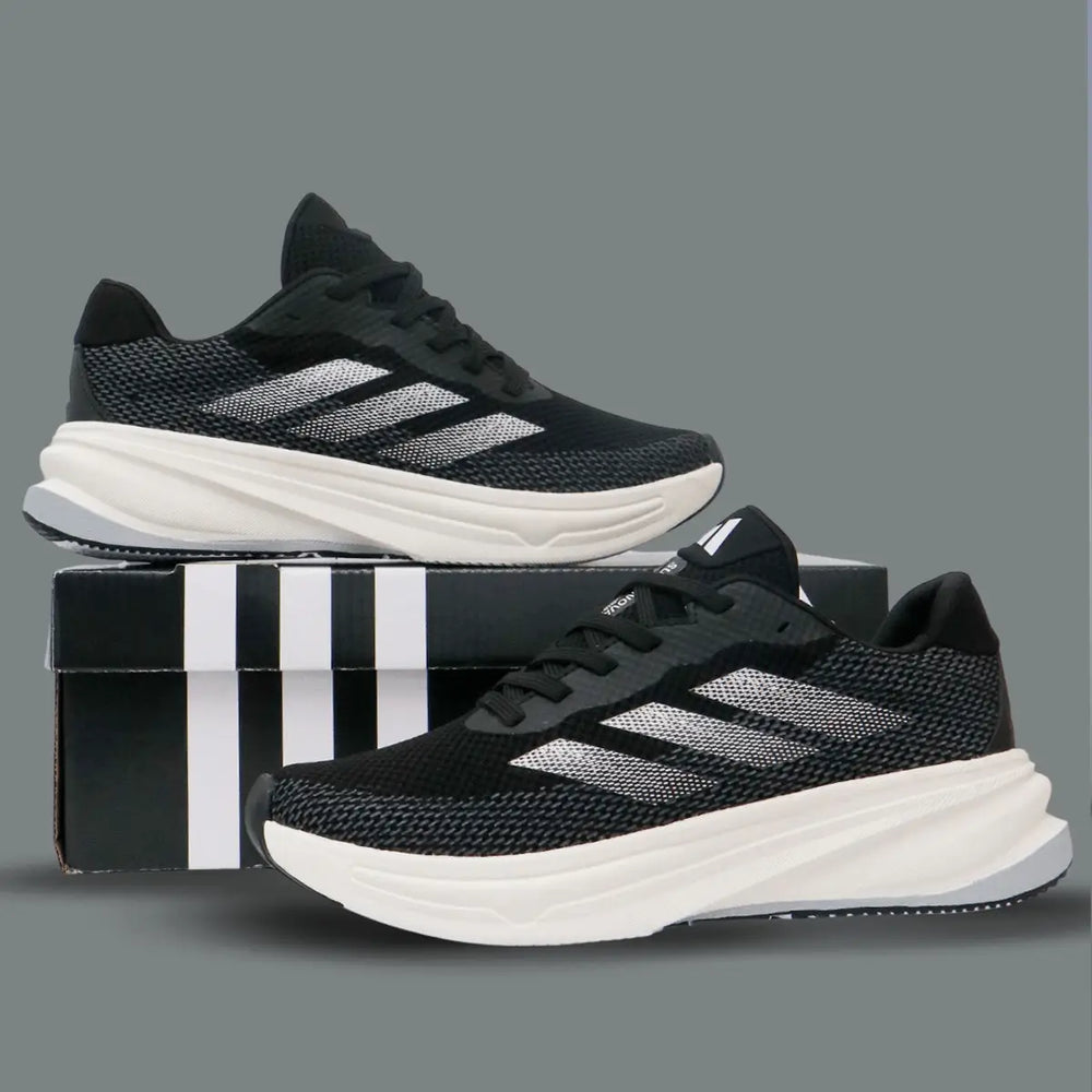 Zapatillas negras para correr con suela gruesa blanca, diseño moderno en tejido transpirable, ideales para deportes y uso diario, ofrecen comodidad, amortiguación avanzada y soporte para los pies, perfectas para mejorar el rendimiento y estilo urbano.